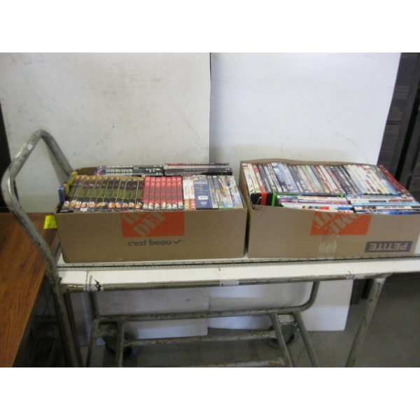 2 BOXES OF DVDs
