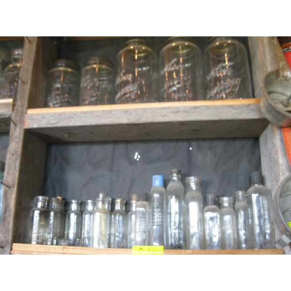2 SHELVES OF GLASS BOTTLES - LINIMENT, KERR CANNING JARS, ETC.