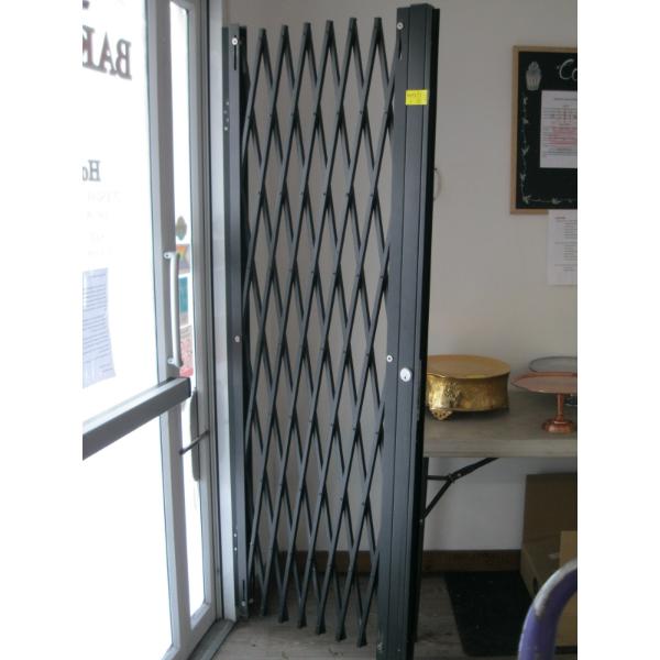 ACCORDIAN TYPE SECURITY DOOR W/KEY