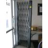Image 1 : ACCORDIAN TYPE SECURITY DOOR W/KEY
