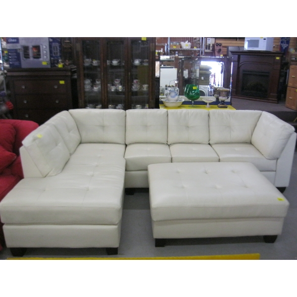 LG. WHITE 2 PIECE SECTIONAL SOFA - SOME DAMAGE ON 1 PIECE - & MATCHING LG. FOOTSTOOL