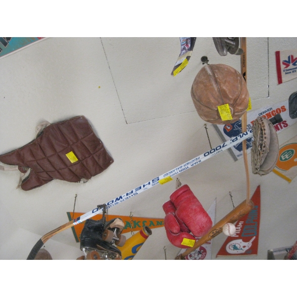 SPORTS MEMORABILIA - SPEED BAG, HOCKEY STICKS, CHEST PROTECTOR, ETC.