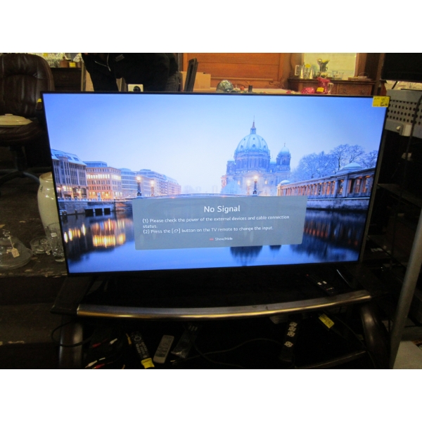 55" LG TV W/REMOTE