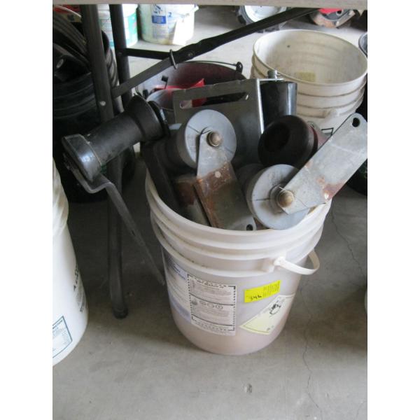 BUCKET W/ASST. BOAT TRAILER ROLLERS, ETC.