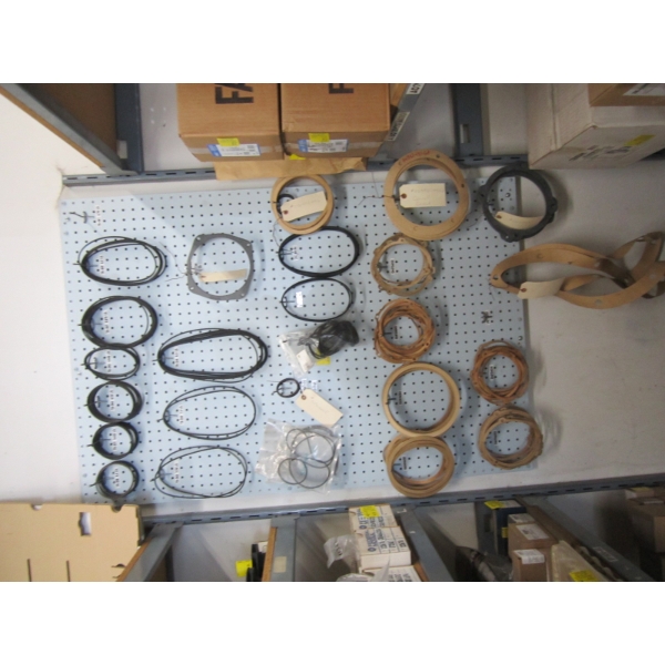 PEGBOARD FULL OF RUBBER GASKETS - VARIOUS SIZES - & CORNELL GASKETS