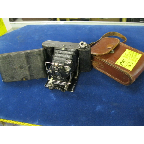 LEATHER CASED BILLOWS  TCARETTE CAMERA