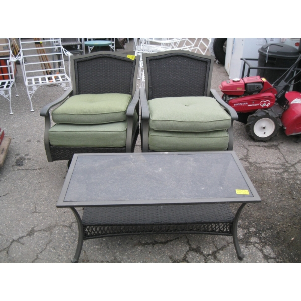 PAIR OF SWIVEL BASED WICKER LOOK PATIO CHAIRS W/CUSHIONS & RECTANGULAR COFFEE TABLE
