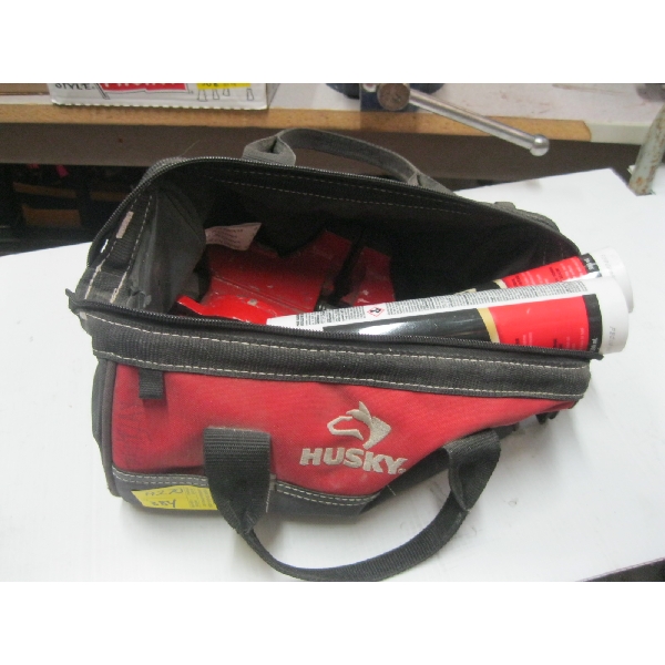 HUSKY BAG W/BENCH VISE & CAULKING
