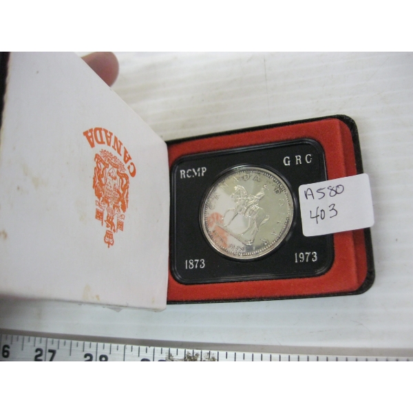 1973 CDN $1 COIN IN CASE