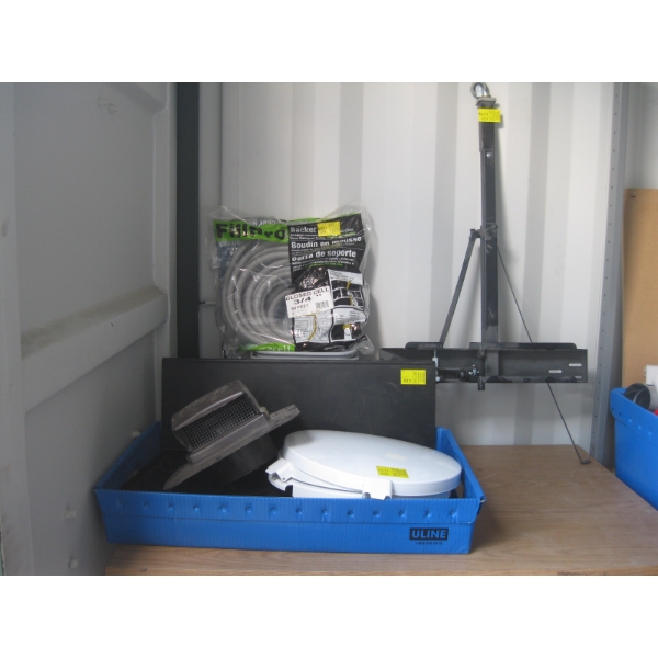 BLUE BIN OF MISC. VENTS, LIDS, BACKER ROD INSULATION, GARBAGE CANS, ETC.