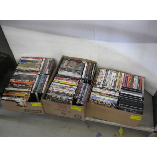 3 BOXES OF DVDs