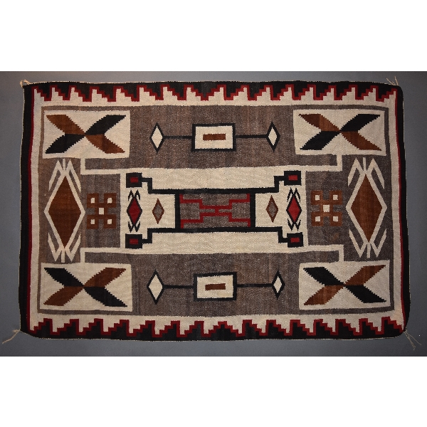 JB Moore Storm Pattern Navajo Rug, Ca. 1920-1930