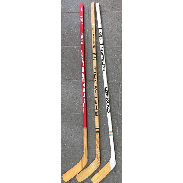 Three Vintage Wooden Hockey Sticks