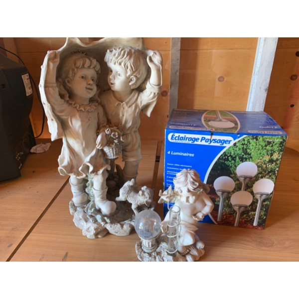 Garden decor two statues and solar lights 