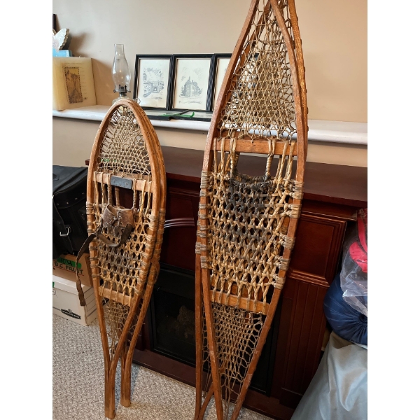 Two sets of authentic original snowshoes Traditional made with wooden frame and a lacing of rawhide 
