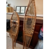 Two sets of authentic original snowshoes Traditional made with wooden frame and a lacing of rawhide 