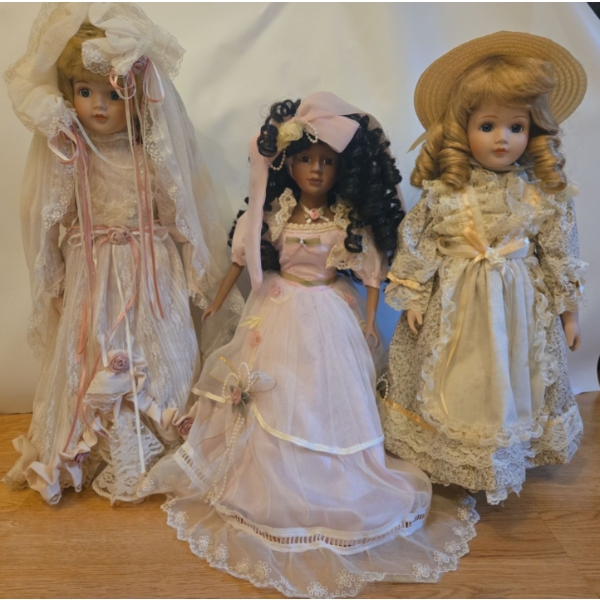 Porcelain Dressed Up Spring Dolls - Tallest is 19T 