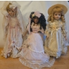 Image 1 : Porcelain Dressed Up Spring Dolls - Tallest is 19T 