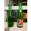 Image 5 :  variety of antique soda bottle collection. Including 7-Up, American dry Canada dry Regina bottlers 