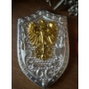 Image 4 : Crests Made of Brass, Plastic, and Wood