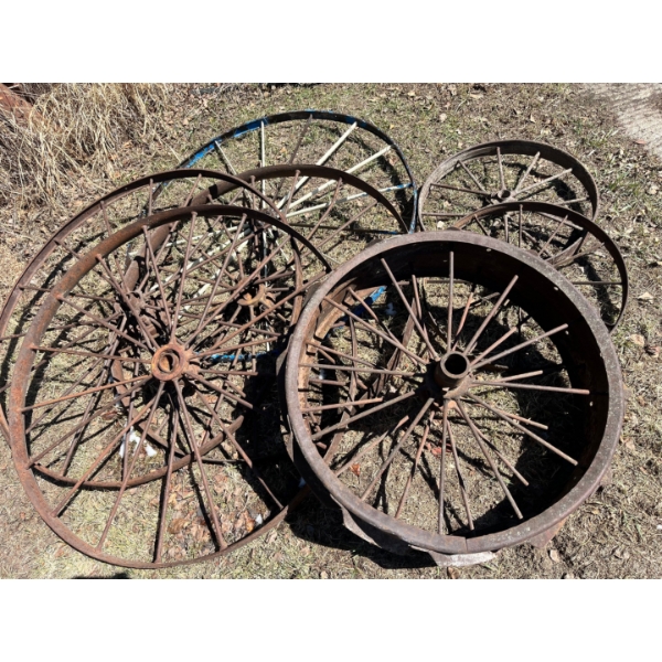 Huge assortment of metal waggon wheels
