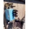 Foldable Lawn Chair, Vintage Cooler, 2 Empty Texas Mickeys, 4 Empty Beer Jugs.