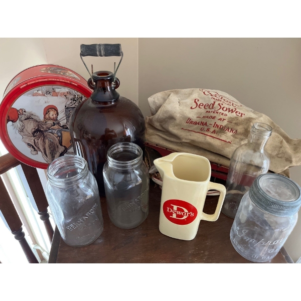Vintage brown jug, antique handheld seed, spreading system, canning jars and a vintage Hinze's glass