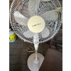Image 1 : Air Work stand-up fan with wooden chair.