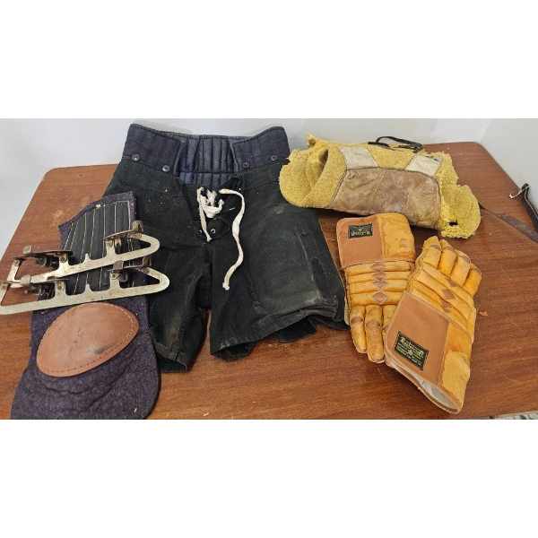 Vintage Hockey Equipment Set Including Pads, Gloves, and Shorts