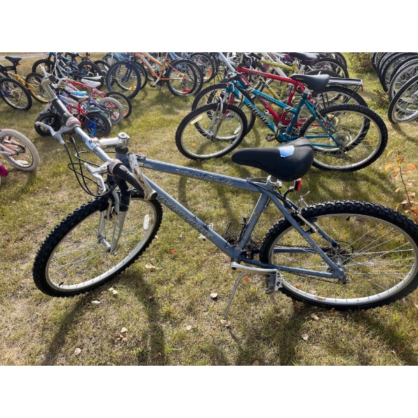 infinity mountain bike with front suspension and front quick release with aluminum back in front tir