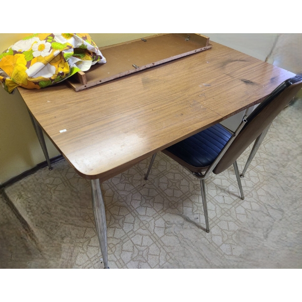 Laminate Dining Table 47 W, 36 D, 30 T and Vinyl Chair 18 W, 17 D, 36 T 