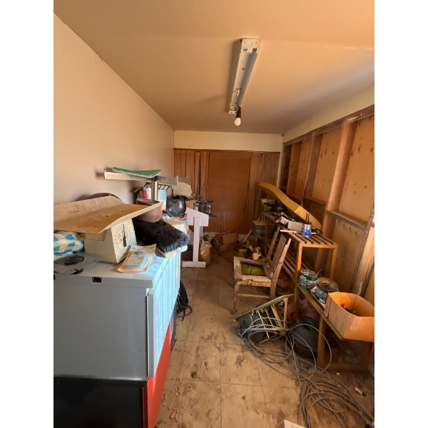 all contents in back room of shed, including vintage skates, chairs a number of bolts and screws. Lo