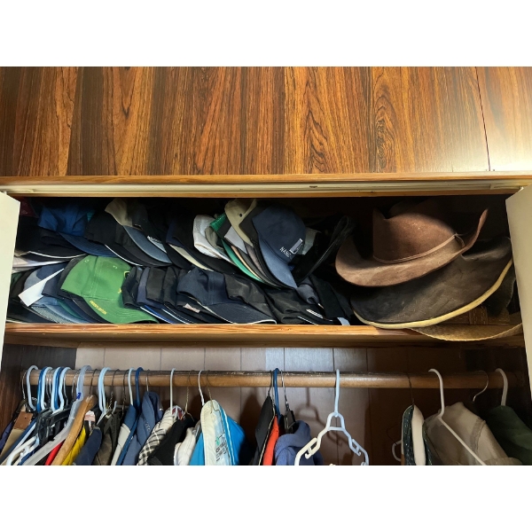 very large collection of vintage hats from all areas, including John Deere and a number of other wel