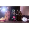 Image 1 : Decorative Bottles, Ceramic Mug, and Lidded Container