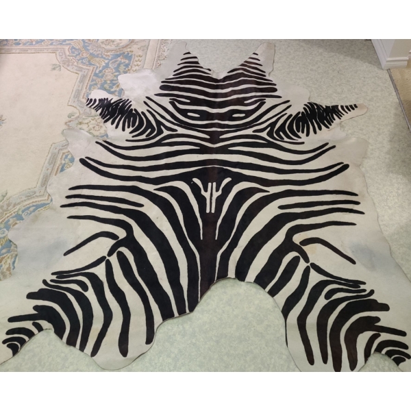 Cow fur area rug with zebra pattern (some discoloration) - 80W, 89T 