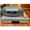 Image 3 : Sony PS3 with remote, Sony Radio/CD Player, Panasonic VHS/DVD player with an assortment of VHS