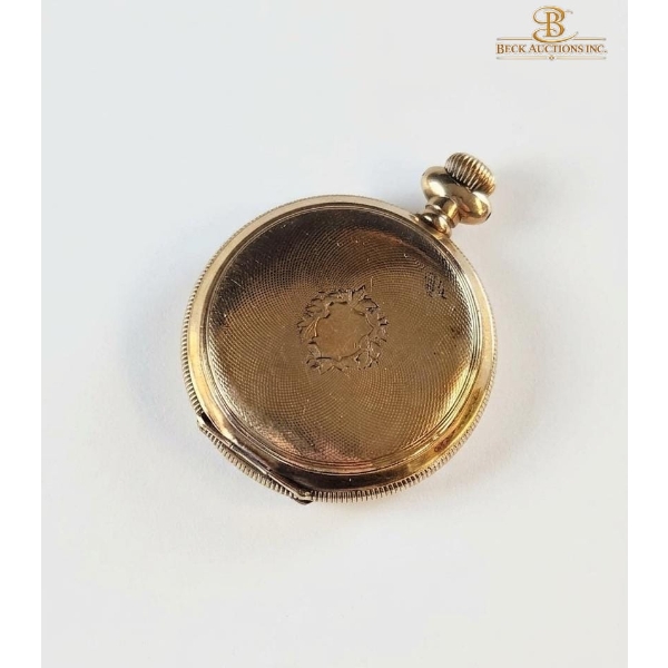 Gold-Filled Vintage G. R. Mutrie Wolseley Pocket Watch With A White Dial And Roman Numerals.