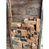 Image 4 :  Collection of blowers and other antique farm implements, including pump and antique bricks