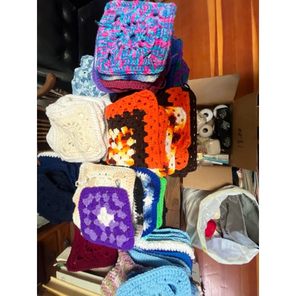 large collection of crocheting thread needles and several other supplies, including a bunch of prema