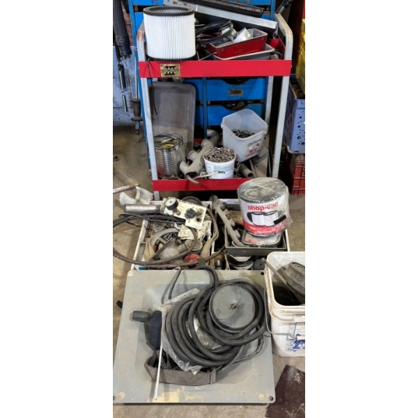 TEC Masters rolling mechanics cart with a number of other miscellaneous items, bolts filters, hoses,
