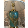 Image 4 :  Vintage porcelain table lamp in a robin egg blue color with brass hardware. Soft white shades .