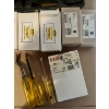 Image 4 : Minico air stapler, huge assortment of staples, and 3 nail pullers 

