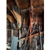 Image 5 : All Yard items on the wall, including pitchforks shovels brooms all sorts of shovels chains 