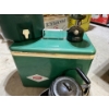 Image 2 : Vintage Coleman cooler with green vintage thermos, water, jug, black camp kettle and a small Coleman