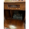 Image 6 : Standard broadcast radio, and record player with a great collection of original 8” records . 