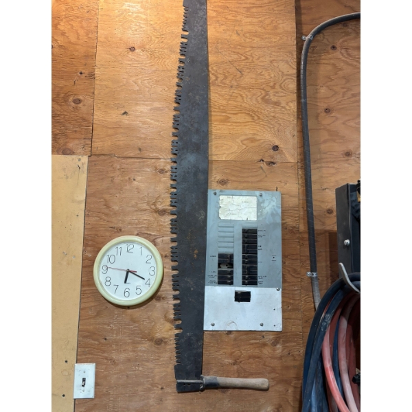 antique saw perfect for a wall hanger in cabin shop or store