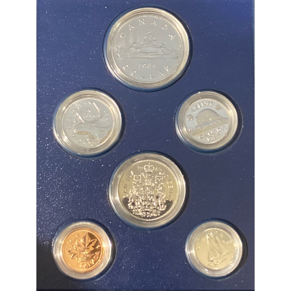 1985 Silver Dollar and 1985 Specimen Set