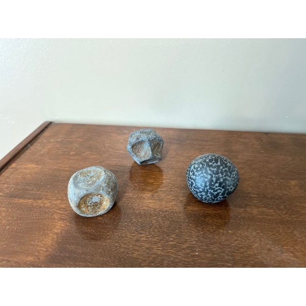A collection of ancient rocks, possibly Egyptian