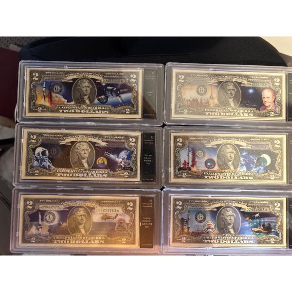 2017 USA Colourized NASA 2$ Notes all Encapsulated in Hard Plastic Protective covers.