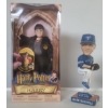 Image 1 :  Matel's Harry Potter & The Sorcerer's Stone Harry Collectible Figurine & Toronto Blue Jays 